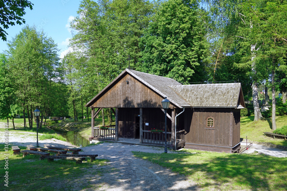 Fototapeta premium Small wooden chapel called `Chapel on Water` in Krasnobrod, Roztocze region, Poland