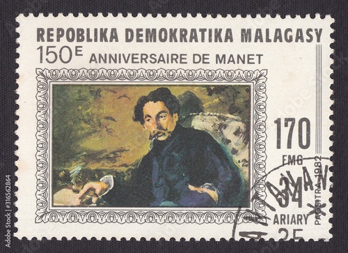 Portrait of artist Edouard Manet (1832-1883), stamp Malagasy republic circa 1982