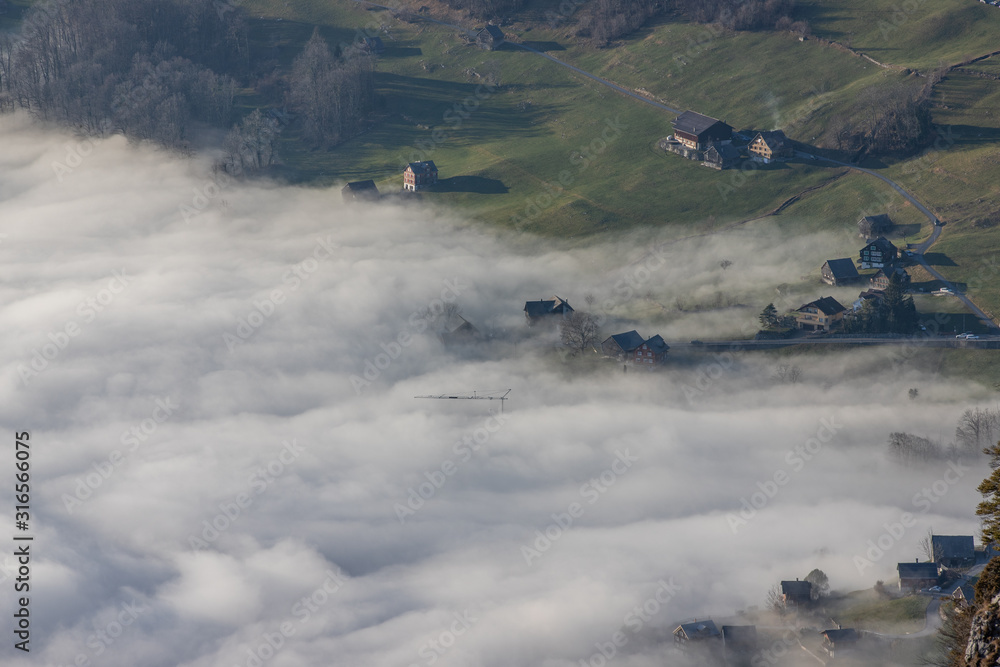 Border of the thermal inversion layer, Amden, Switzerland, Europe Border of the thermal inversion layer, Amden, Switzerland, Europe