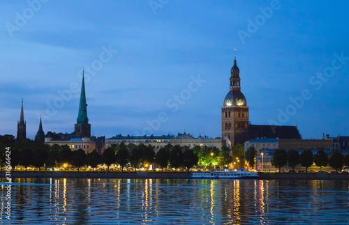 Riga, Latvia. View of the night city across the Daugava River..