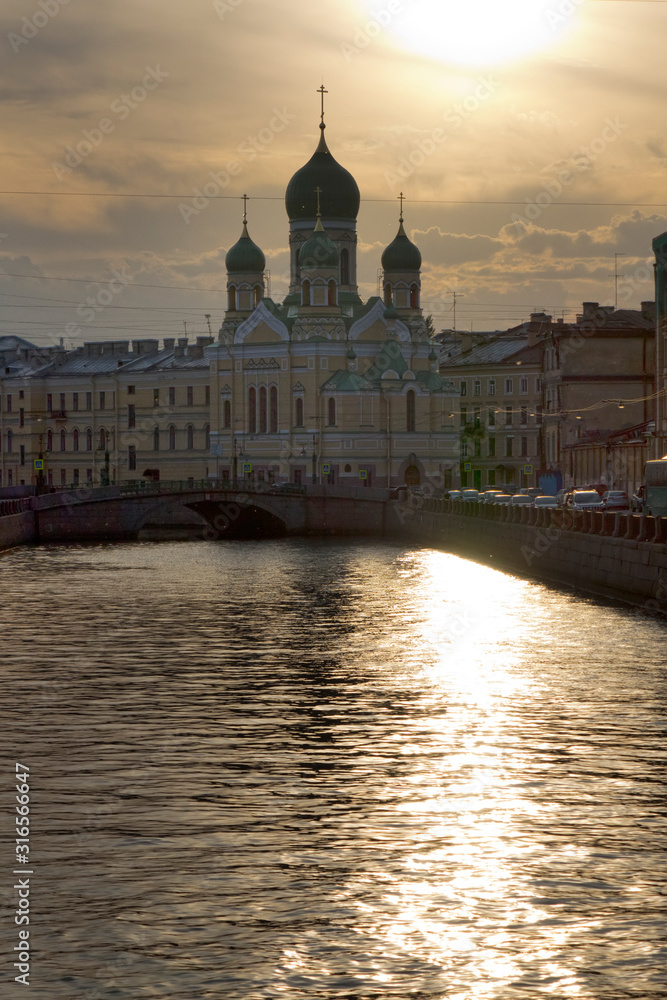 Isidor Church on the Griboedov Canal at sunset. Saint-Petersburg, Russia