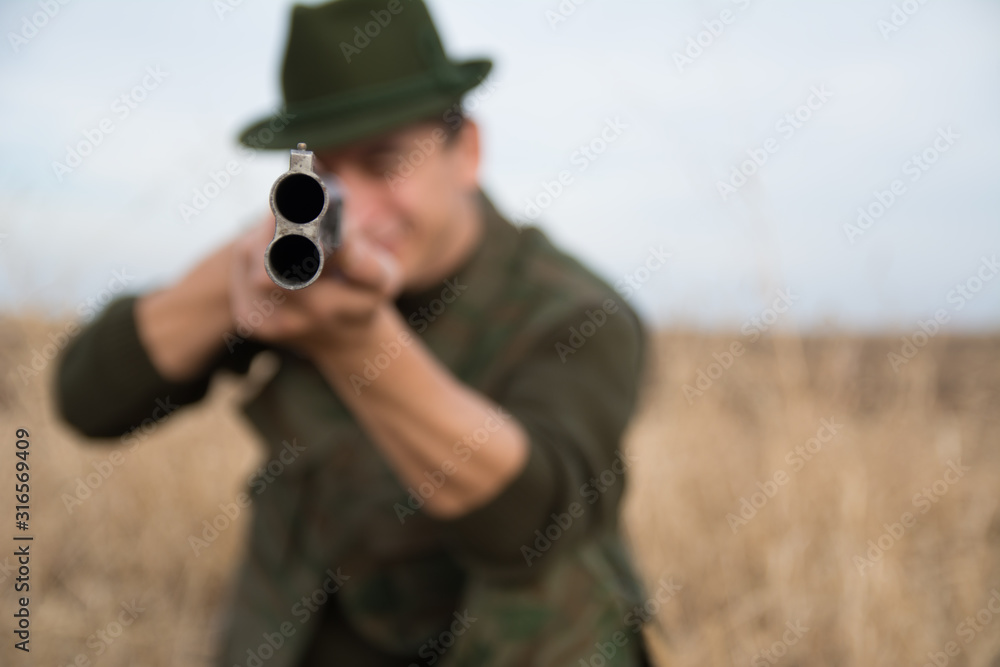 Fototapeta premium Close Up of a riffle pipe with hunter holding it