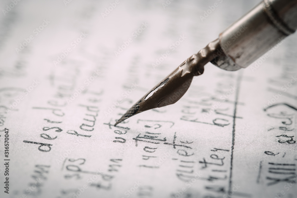 Fountain pen on an ancient handwritten letter. Old story. Retro style. Fountain pen on an ancient handwritten letter. Old story. Retro style.