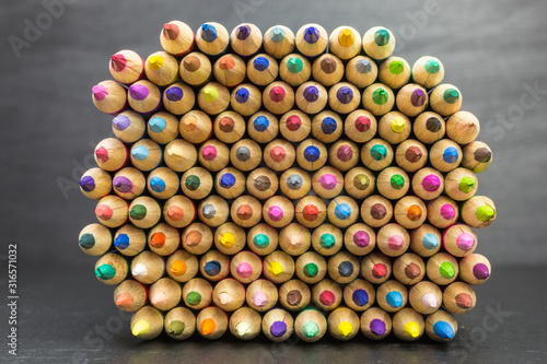 heap of multicolored pencils close-up
