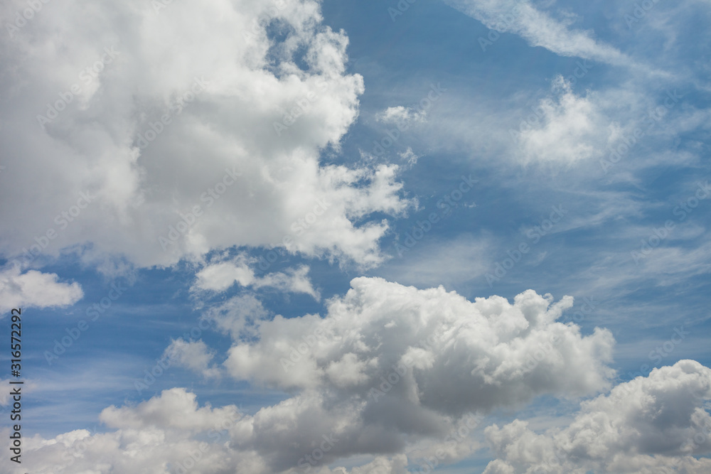 cloudscape with blue sky after a summer storm