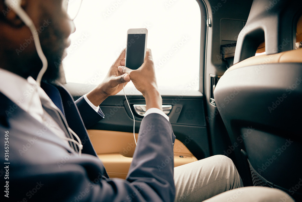 Man taking photos from inside the car.