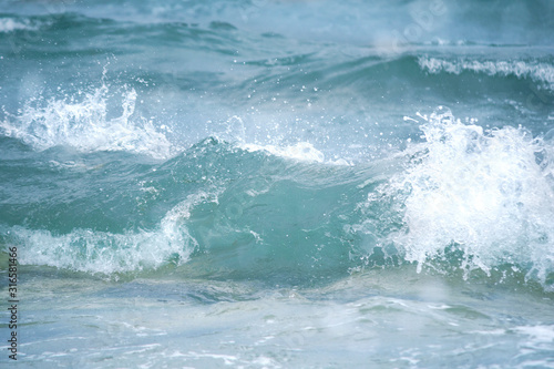 Close up Blue Adriatic sea water wave.water background. © Studio 888