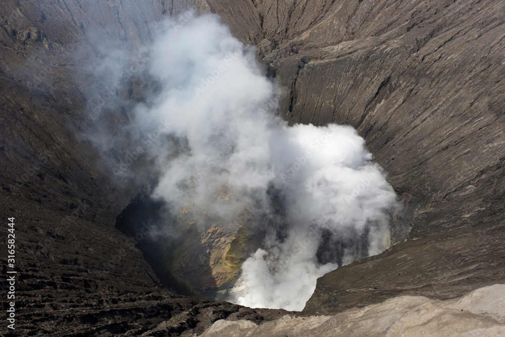 Looking inside Bromo volcano in Java island