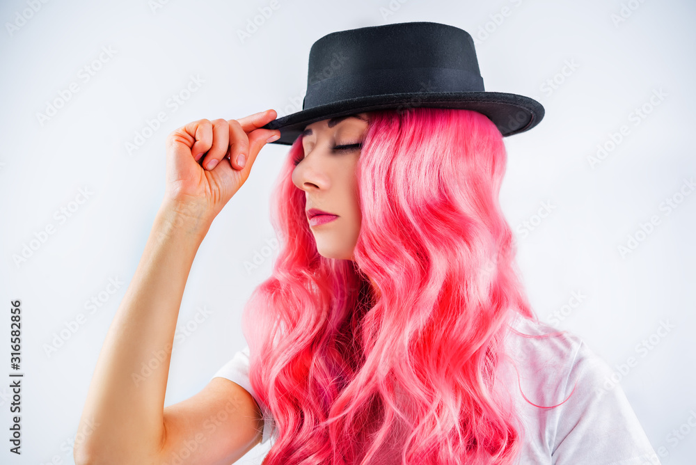 Girl with pink hair on a white background Girl with pink hair on a white background
