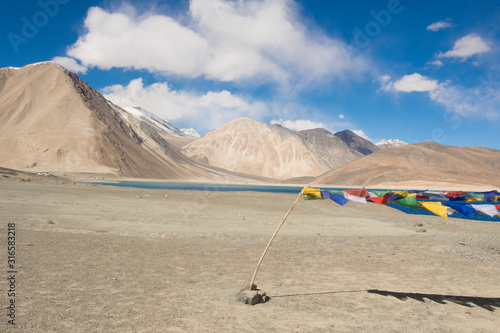 Buddhist flag   Pangong Tso lake in Ladakh  India