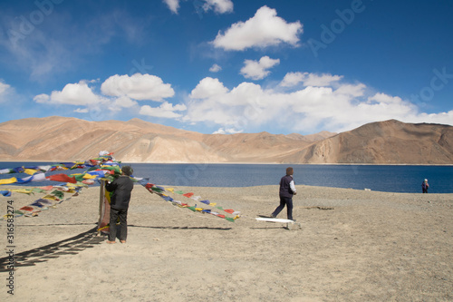 Buddhist flag Pangong Tso lake in Ladakh, India
