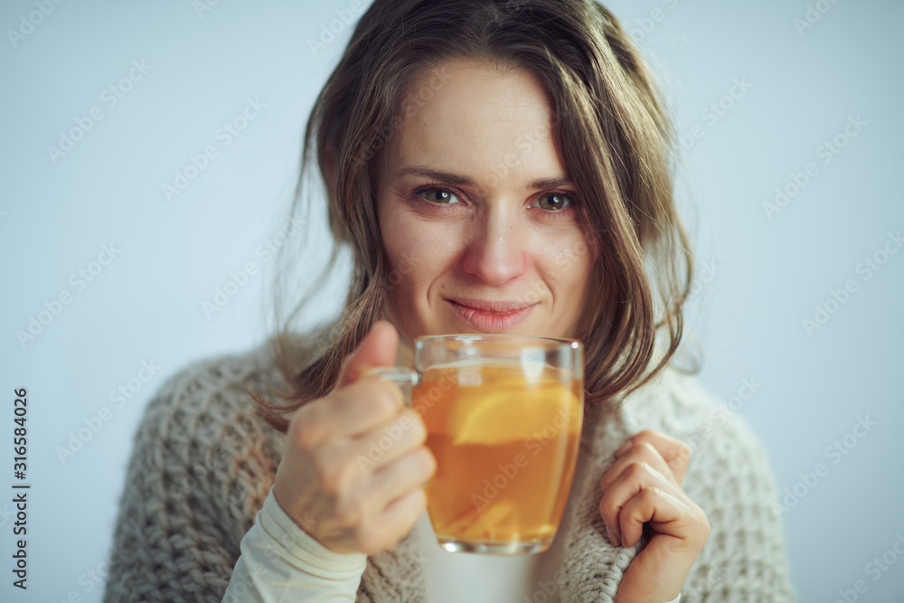smiling ill elegant housewife holding cup of tea smiling ill elegant housewife holding cup of tea