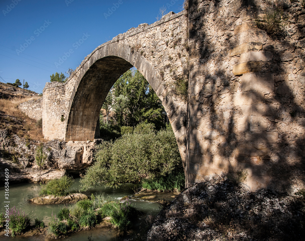 Roman bridge in Cuenca, Spain. Image.