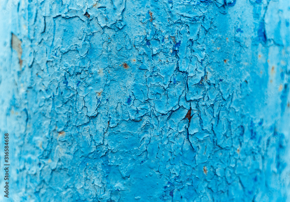 Old Rusty painted metal background. Blue Peeling paint texture.