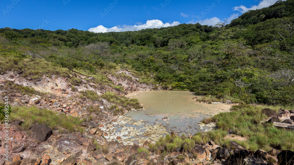 pool of mud and hot water on the slopes of the Rincon de la Vieja volcano