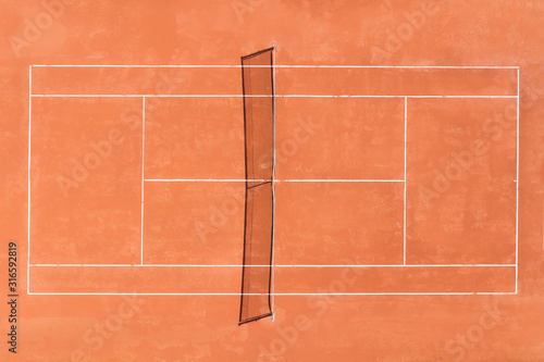 Aerial view of a prfessional red clay court, ready to play Tennis. photo