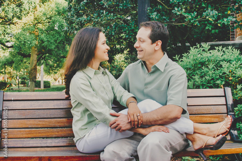 Smiling Each Other on a Bench