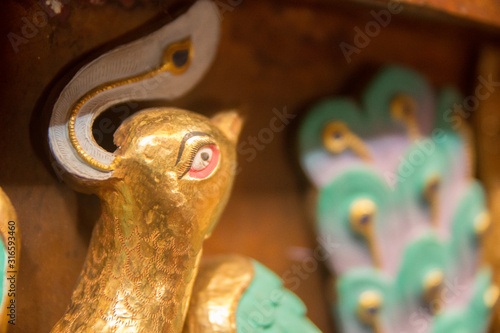 dragingolden sculptures in a temple in ladakh photo