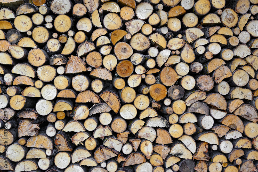 Pile of chopped fire wood, prepared for winter Pile of chopped fire wood, prepared for winter
