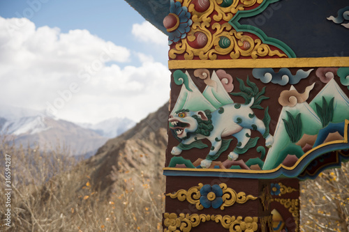 Buddhist paintings on the wall in Hemish monastery,  ladakh photo