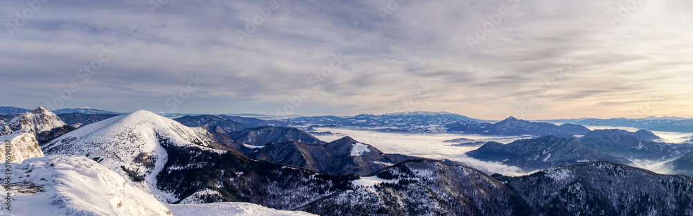 Beautiful winter panorama in Winter Mountains. Landscape with spruce trees  in Mountains , blue sky . Slovakia Mala Fatra