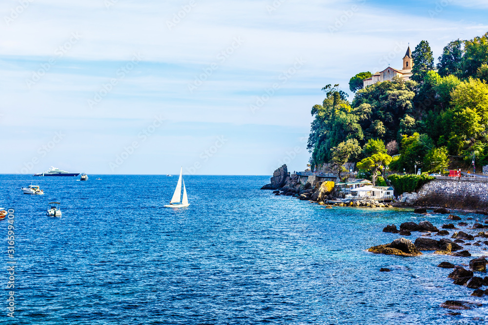Landscape view of the little city and beach of Camogli in the mediterranean coast of Liguria in Italy