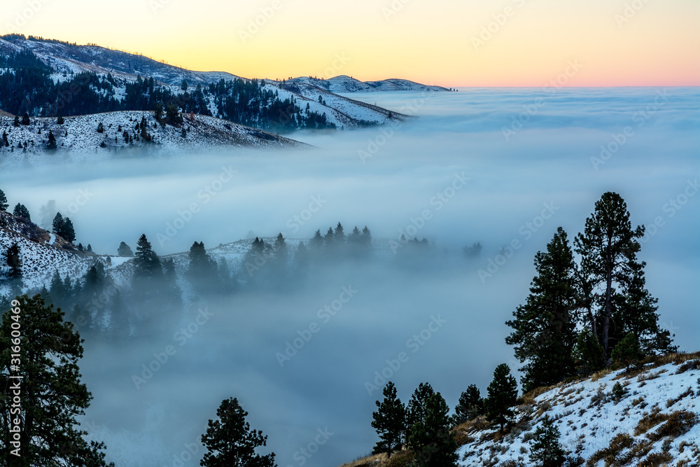Inversion fog filled valley over Boise Idaho in winter