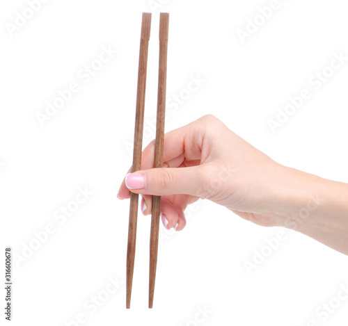 chopsticks in hand on a white background isolation