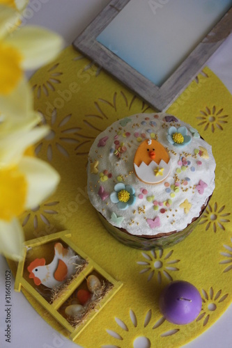 Easter background with handmade easter cake and egg in flat lay style