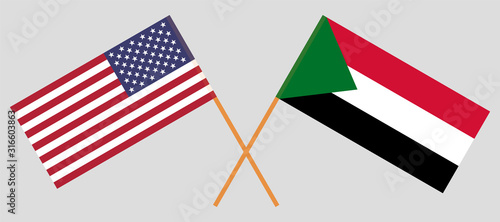 Crossed flags of Sudan and the USA