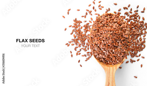 Spoon of flax seeds on white background with space for text
