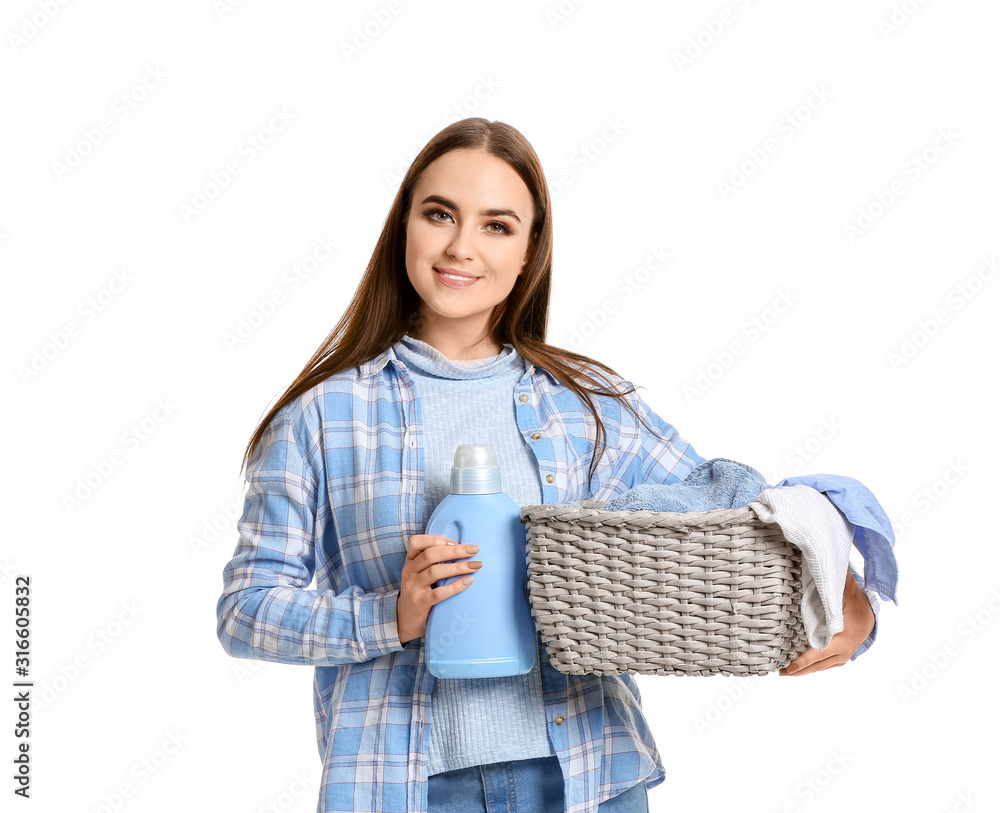 Beautiful young woman with laundry on white background Beautiful young woman with laundry on white background