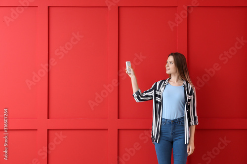 Young woman with air condit...