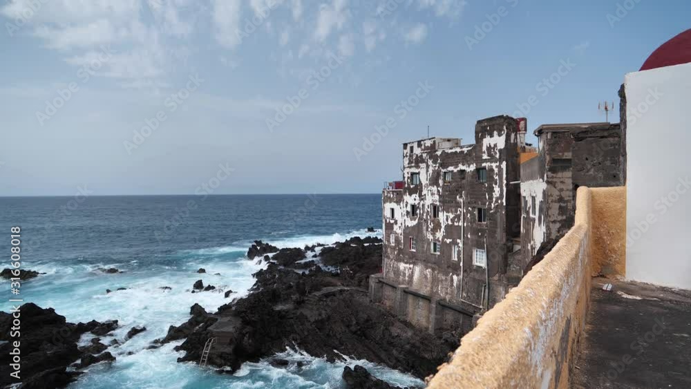 Building on the coast of Atlantic ocean in Punta Brava small town near Puerto de la Cruz city, Tenerife island, Canary islands, Spain Building on the coast of Atlantic ocean in Punta Brava small town near Puerto de la Cruz city, Tenerife island, Canary islands, Spain