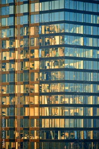 Abstract background. The texture of a skyscraper made of glass and metal.