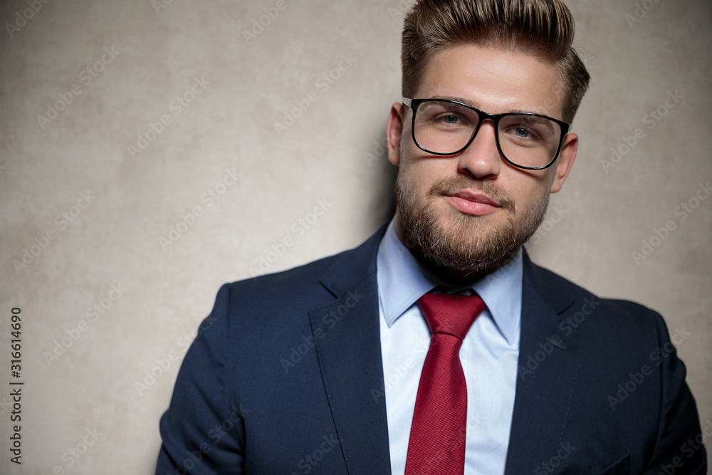 businessman standing and staring at camera serious businessman standing and staring at camera serious
