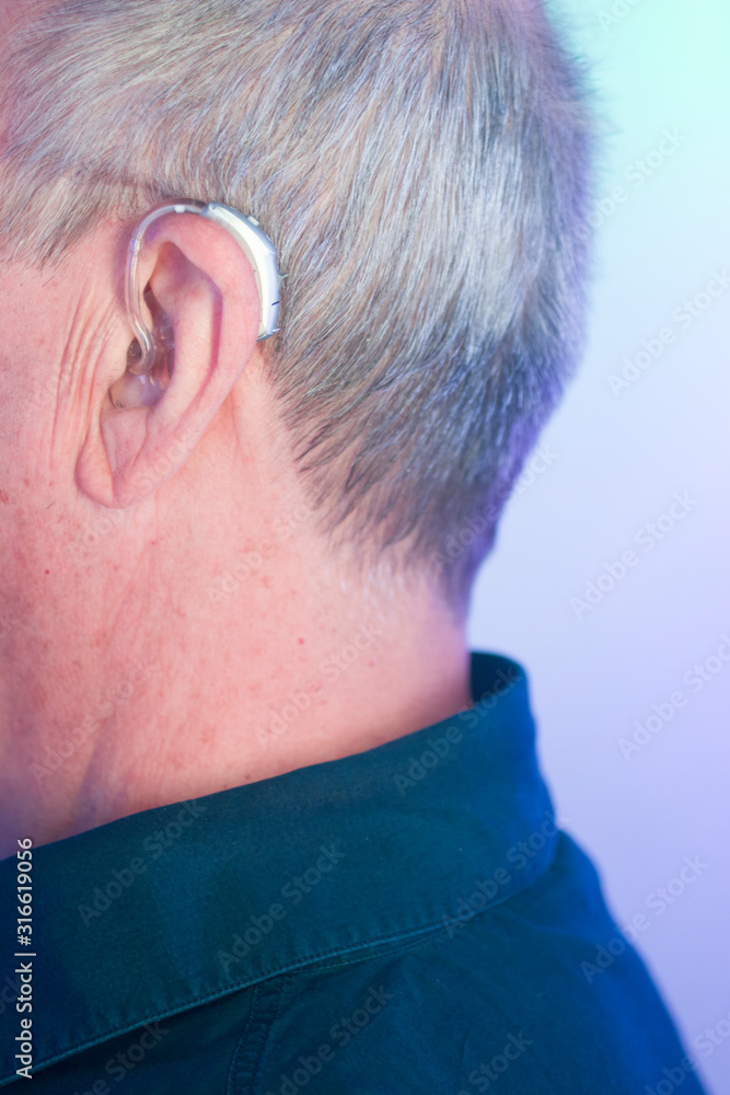 Fototapeta premium Man with hearing aid