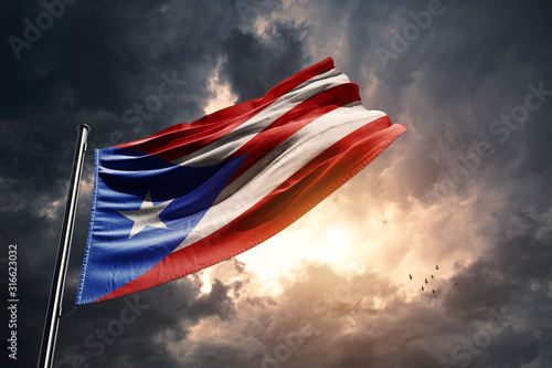 Puerto Rico flag and a dramatic sunset photo