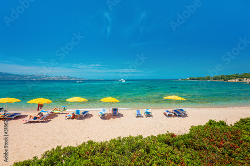 Public Beach in Cannigione - Arzachena Gulf - Sardinia - Italy. Beautiful beach frequented by the locals too