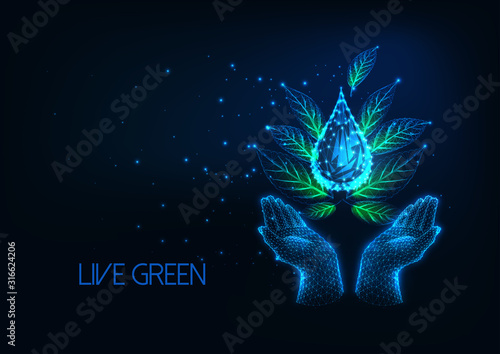 Futuristic environmentally friendly lifestyle concept with hands holding green leaves and water drop