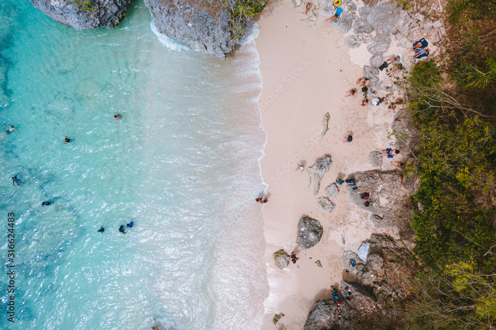 Most beautiful beach in Bali Padang Padang Beach with crystal clear water aerial view