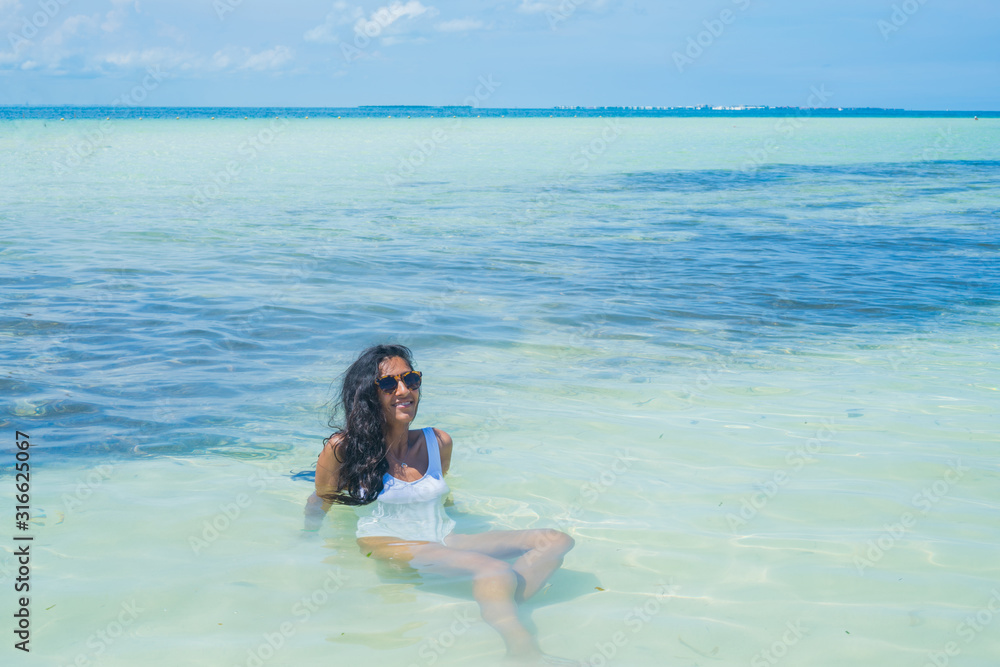 Young indian woman happy in the beach Young indian woman happy in the beach