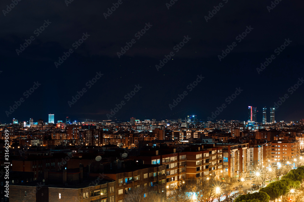 Panoramic aerial view of Madrid at night, Metropolis Building lights, capital of Spain, Europe