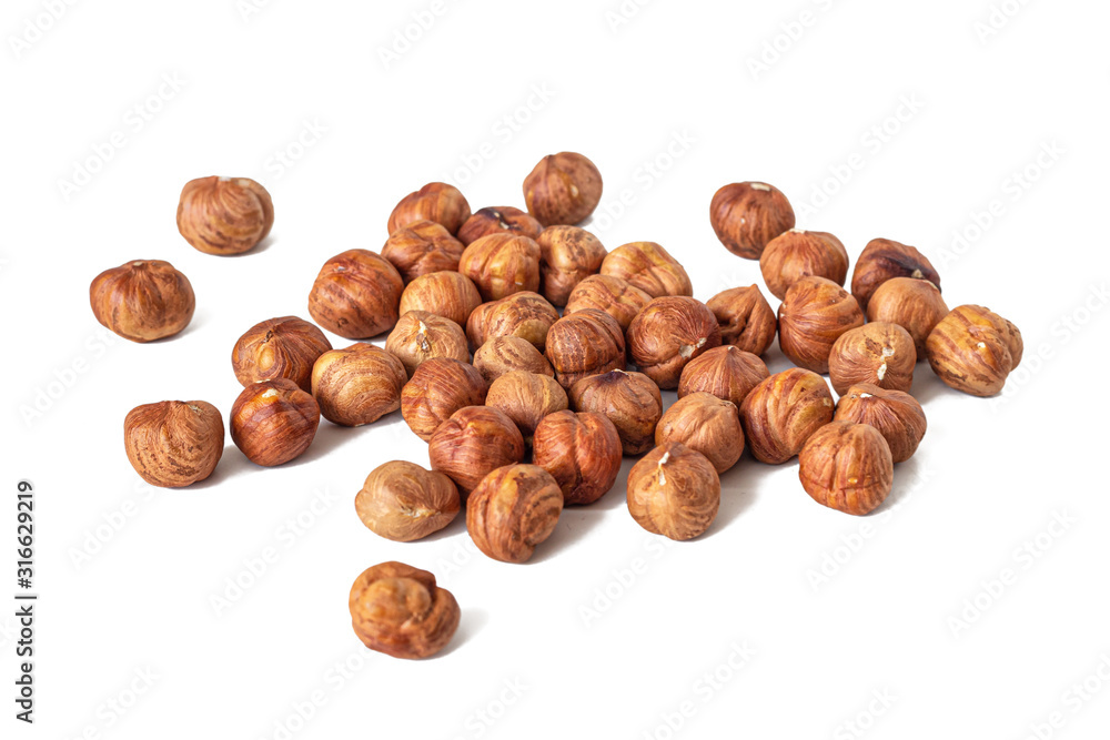 Handful of hazelnuts, peeled from the hard shell Handful of hazelnuts, peeled from the hard shell