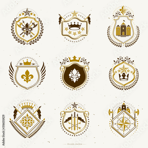 Set of vector vintage emblems created with decorative elements like crowns, stars, bird wings, armory and animals.  Collection of heraldic coat of arms.