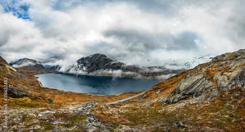 Autumn landscape of cloudy Norway - panorama