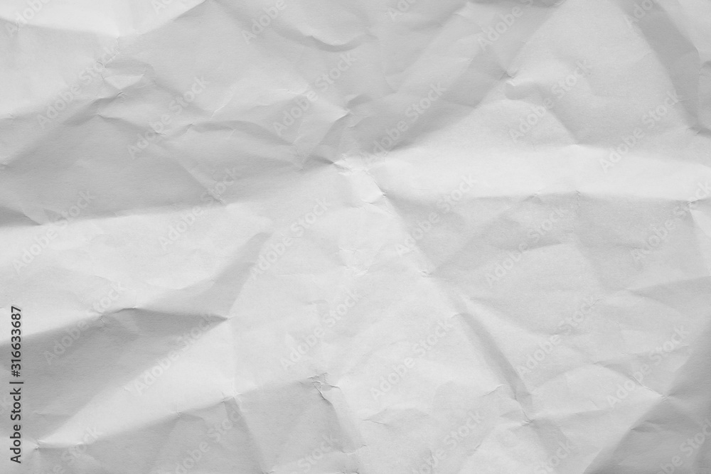 Fototapeta premium Biały zmięty papier, miejsce do pisania lub rysowania, tło dla oryginalnej grafiki