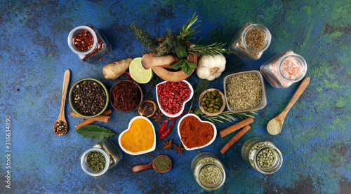 Spices and herbs on table. Food and cuisine ingredients with pepper