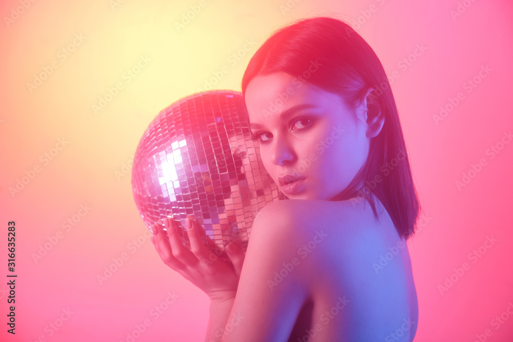 Naklejka premium Girl with disco ball