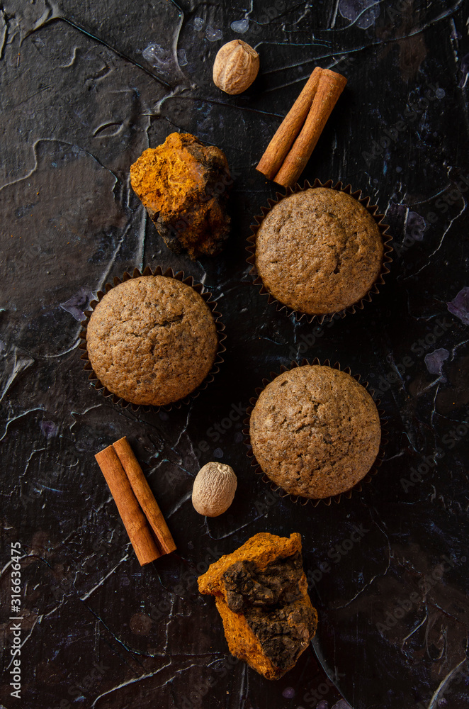Chaga muffins - Superfood Trend on dark background